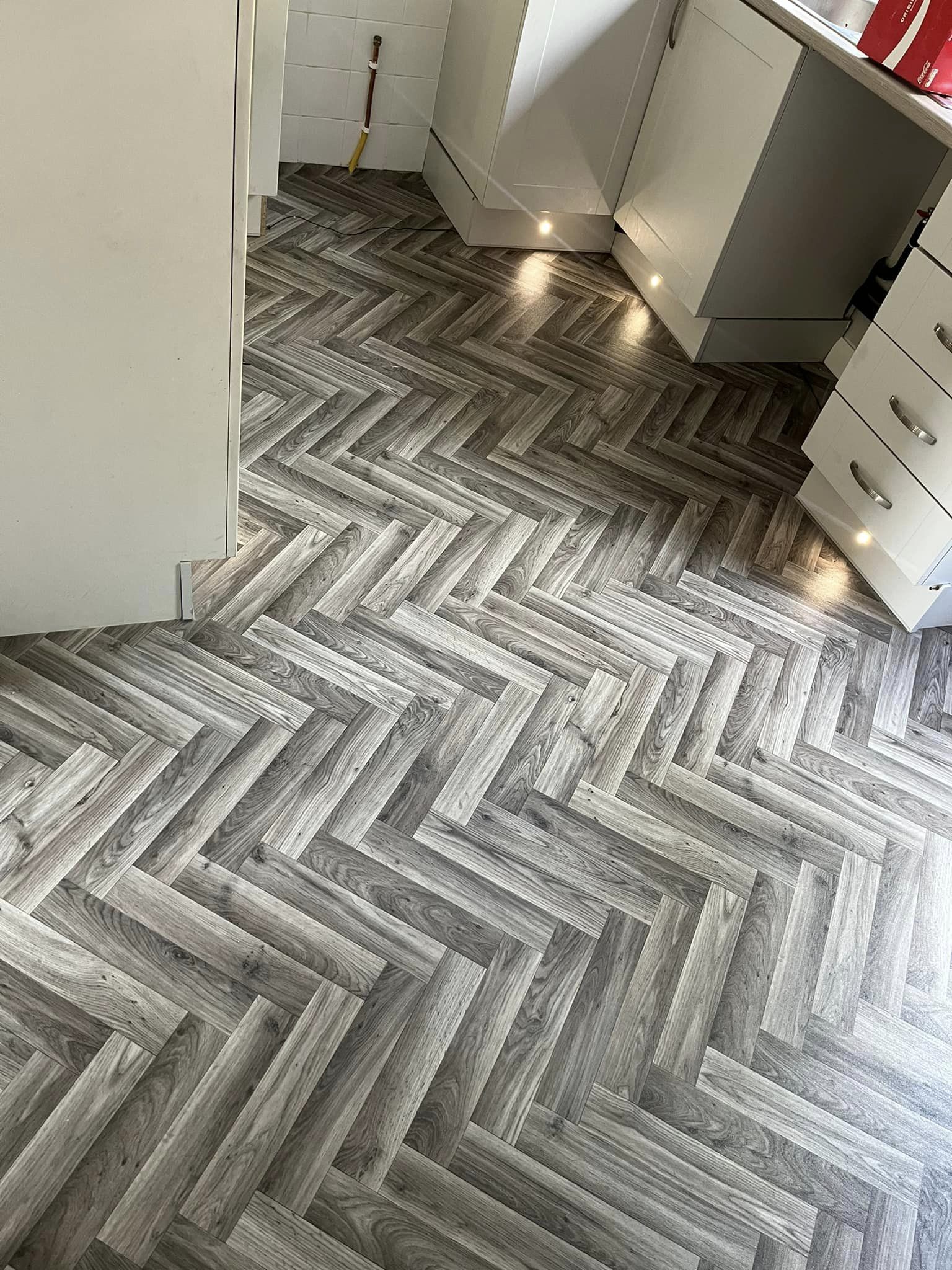 herringbone flooring in kitchen