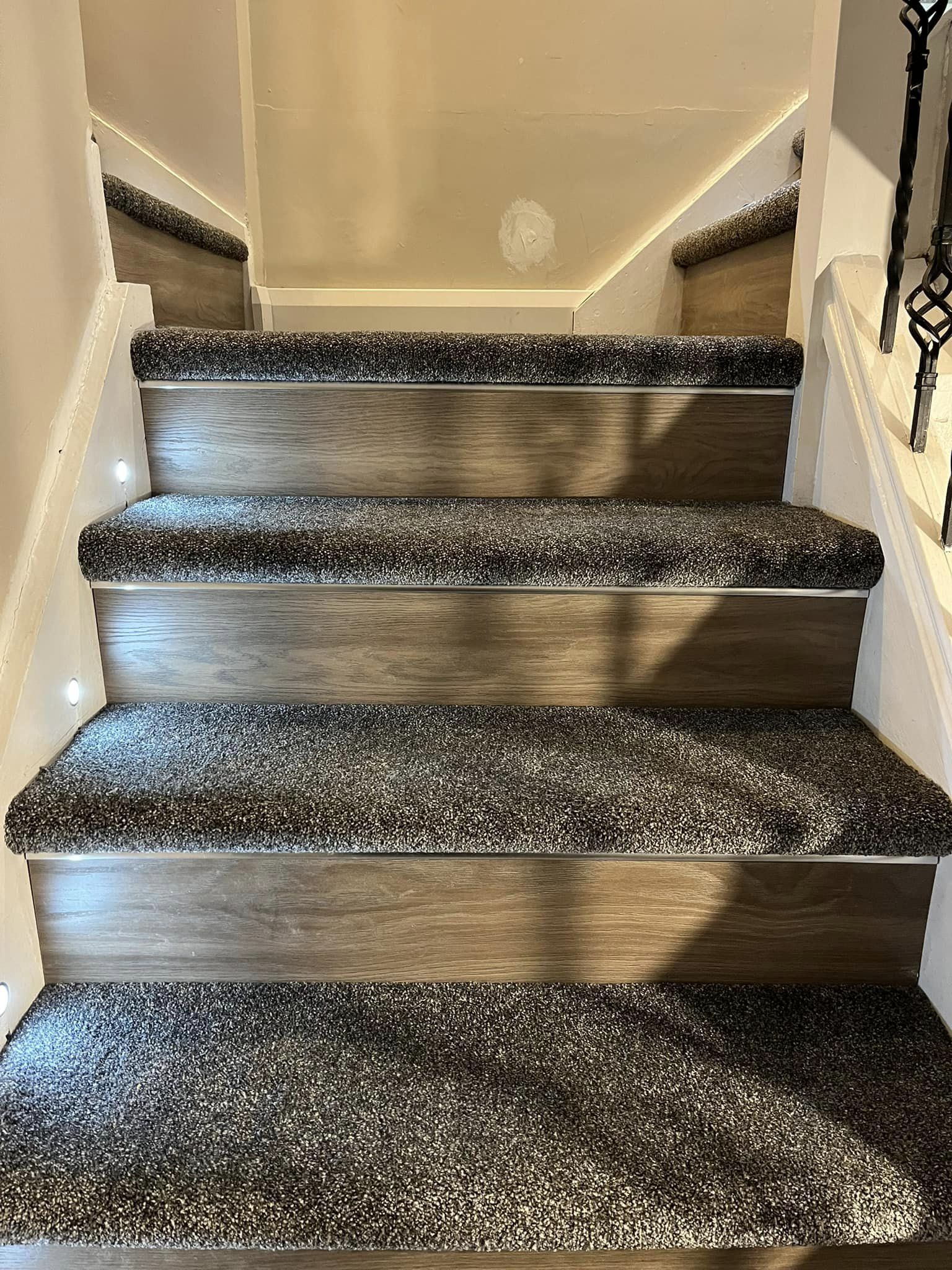 Carpet and wooden floor